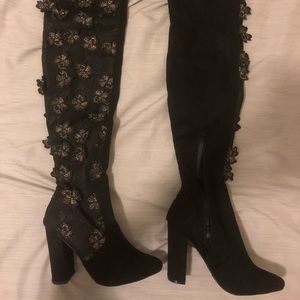 Thigh high black boots